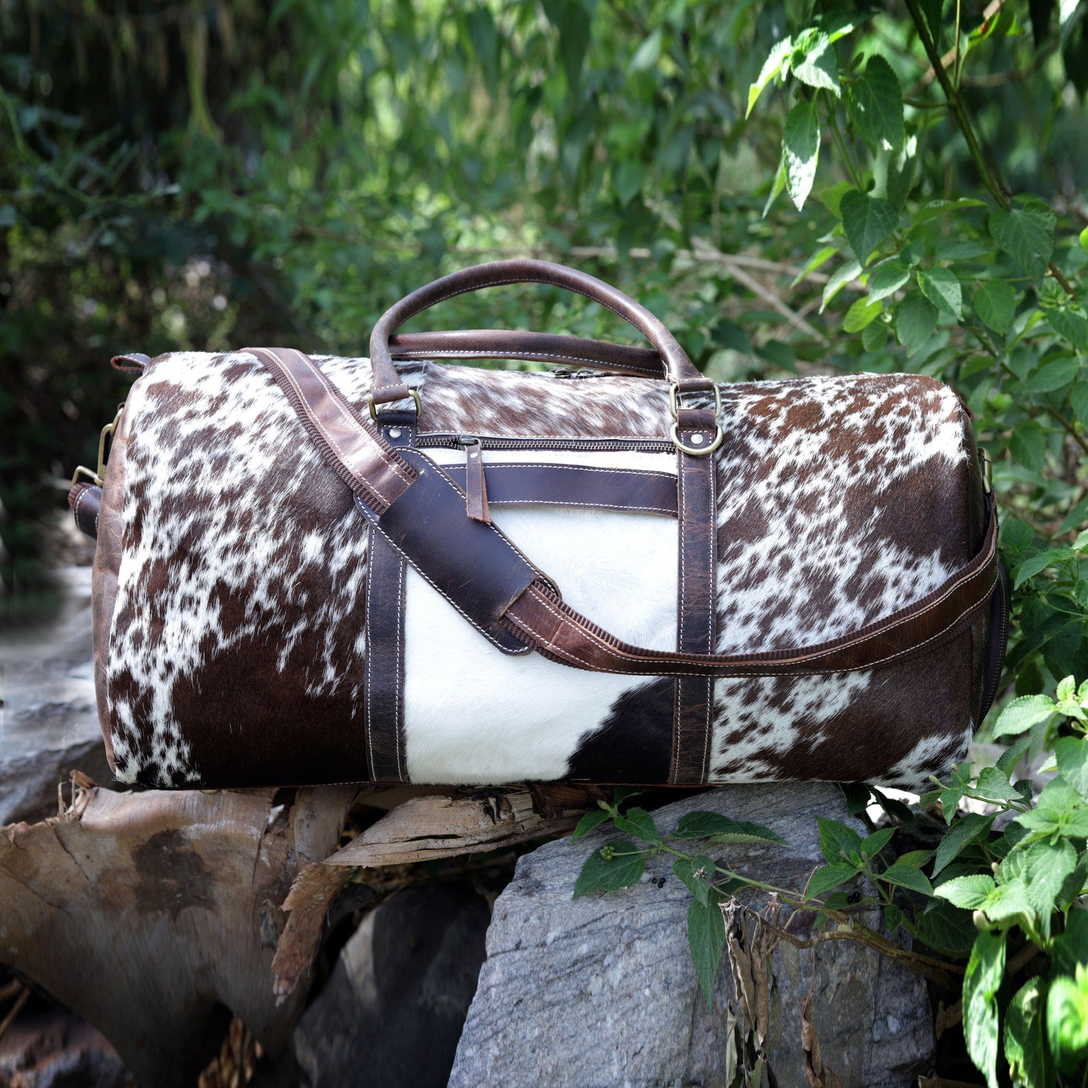 Travel in opulence with a refined cow fur overnight bag, your essential companion for indulgent adventures.