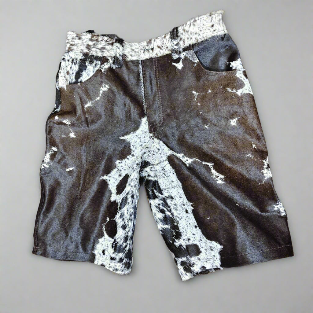 Genuine tricolor cowhide shorts for men with hair-on cow skin. Western-style cow shorts perfect for rodeo events, southern outfits, and cowboy festivals.