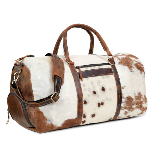Define your travel experience with this cowhide duffle bag, a symbol of wanderlust and refined taste for the intrepid traveler.