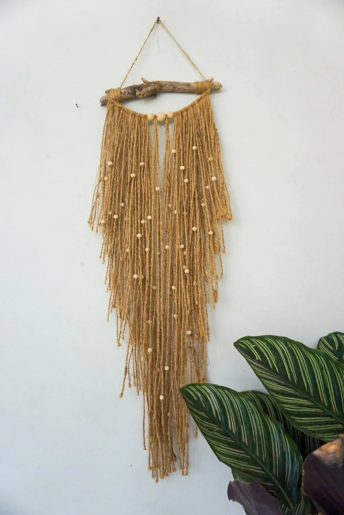 Driftwood jute wall hanging with wooden beads