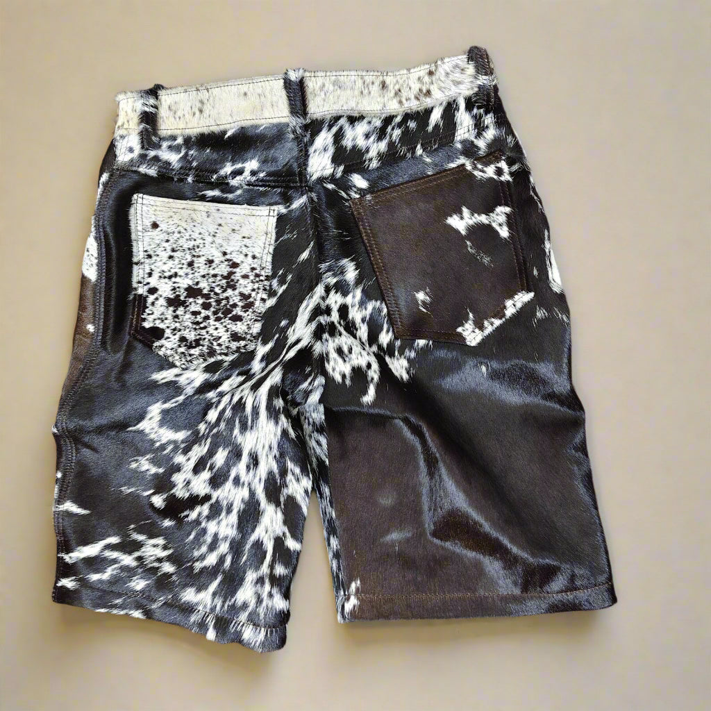 Stand out in men’s cow print shorts made from real hair-on cowhide leather. Designed for rodeo looks, country concerts, and bold western wear styling.