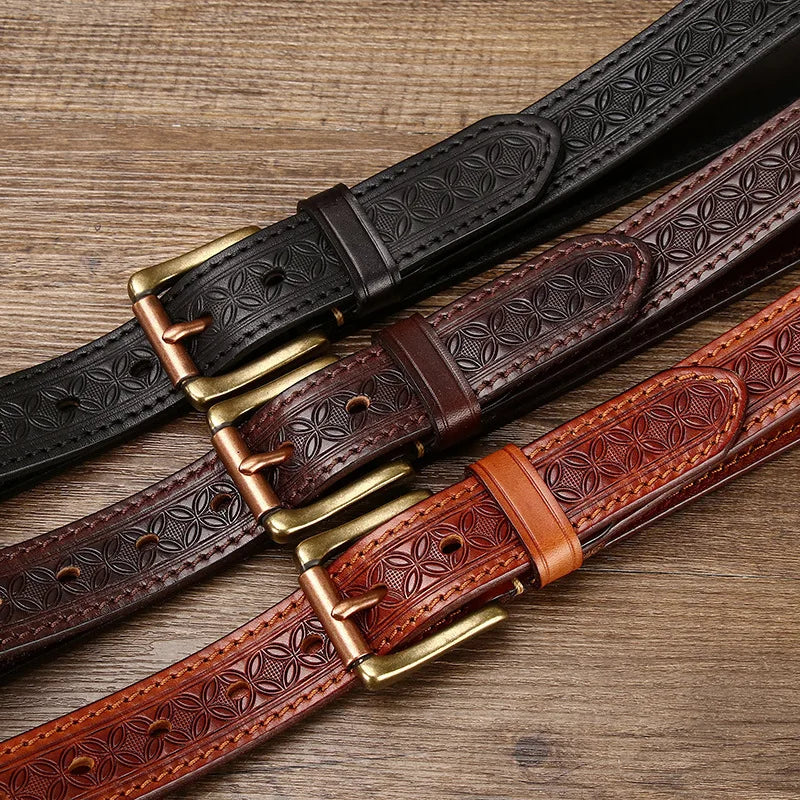 Genuine cowhide leather belt wellington featuring a copper pin buckle and detailed totem pattern. A bold accessory for men’s denim looks..