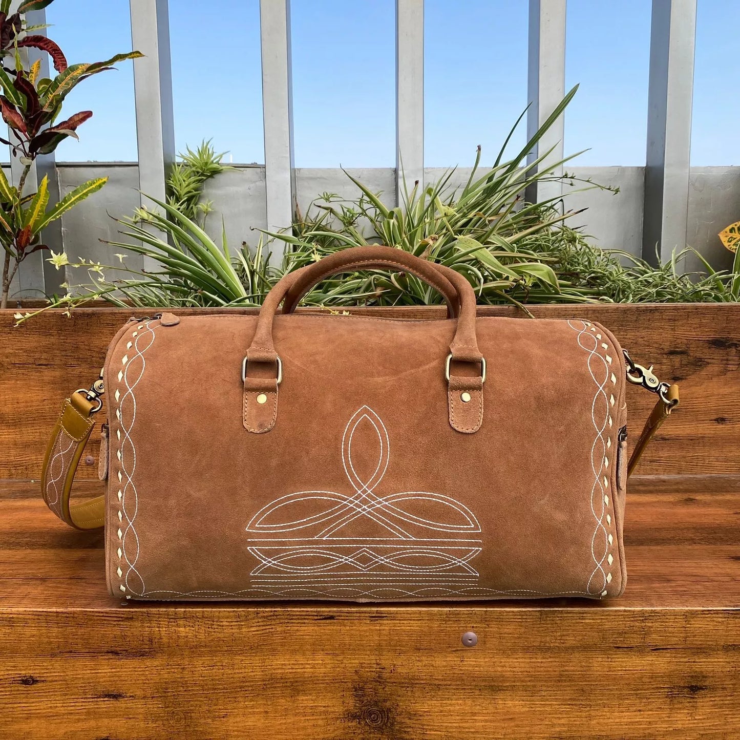 boot stitched weekender luggage