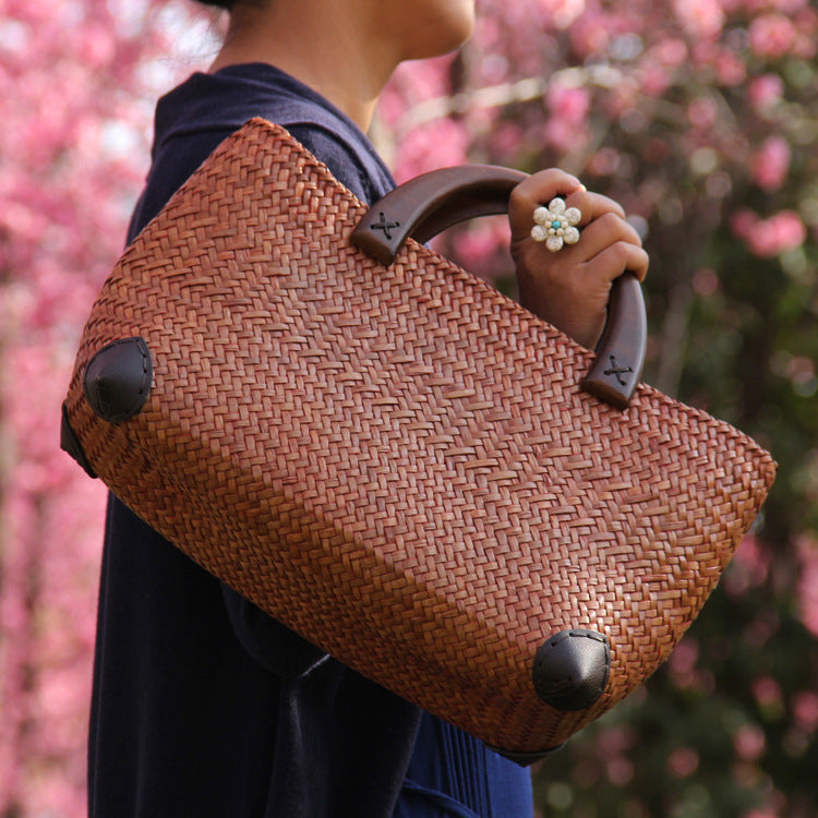 Woven Straw Rattan Handbag with Wooden Handles and Leather Corners