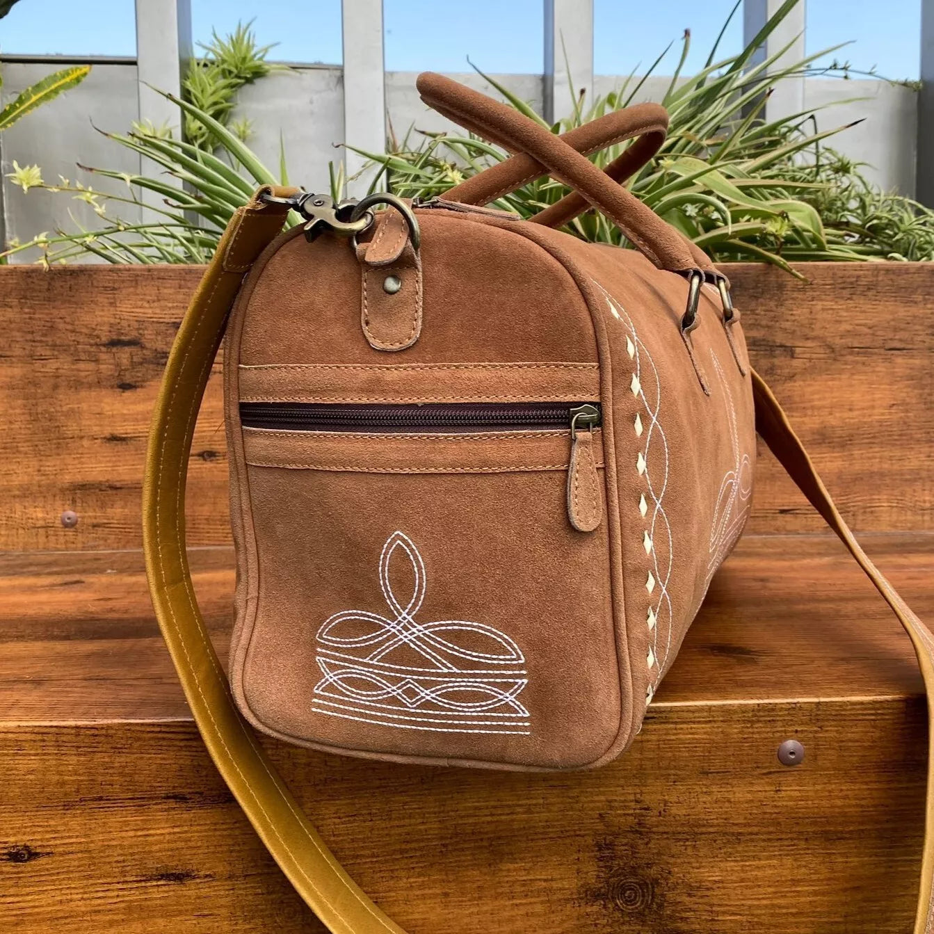 boot stitched weekender luggage