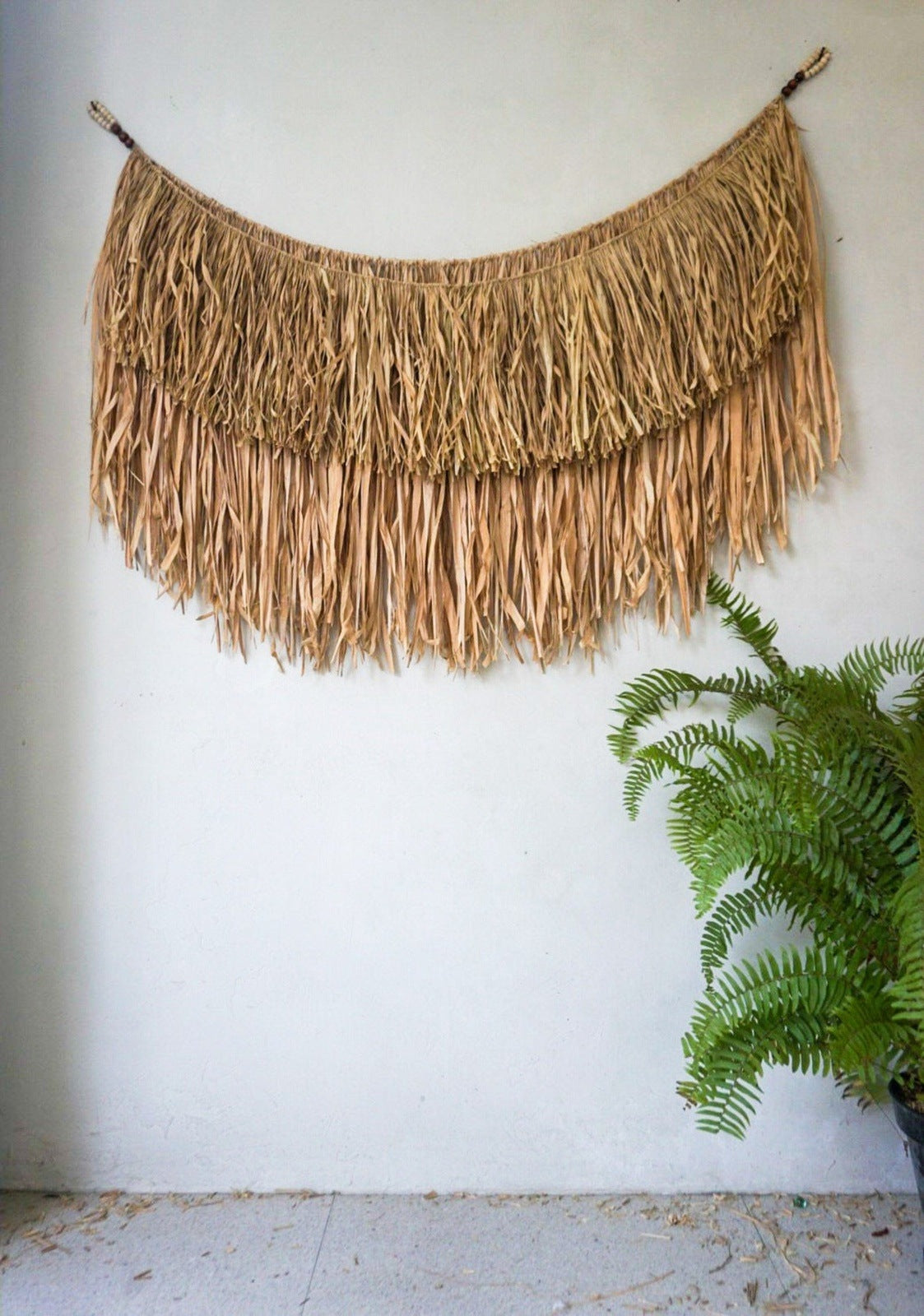 Natural raffia and seagrass wall hanging
