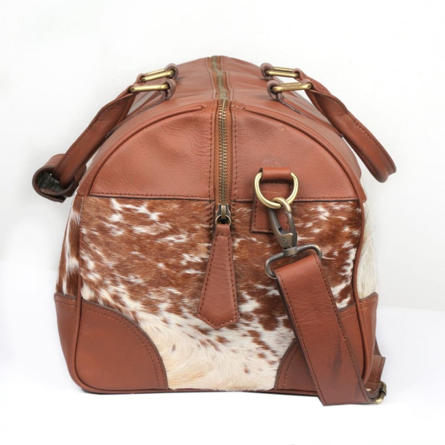 Make your mark with a rugged cow hide duffle bag, your perfect companion for all your explorations.