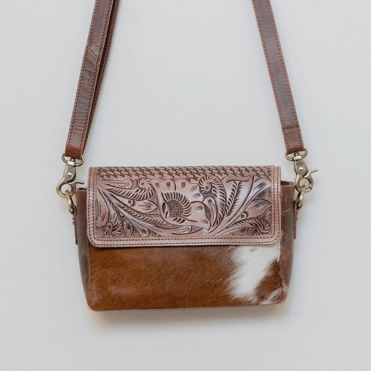 Handmade Tooled Leather Crossbody Bag with Cowhide Fur