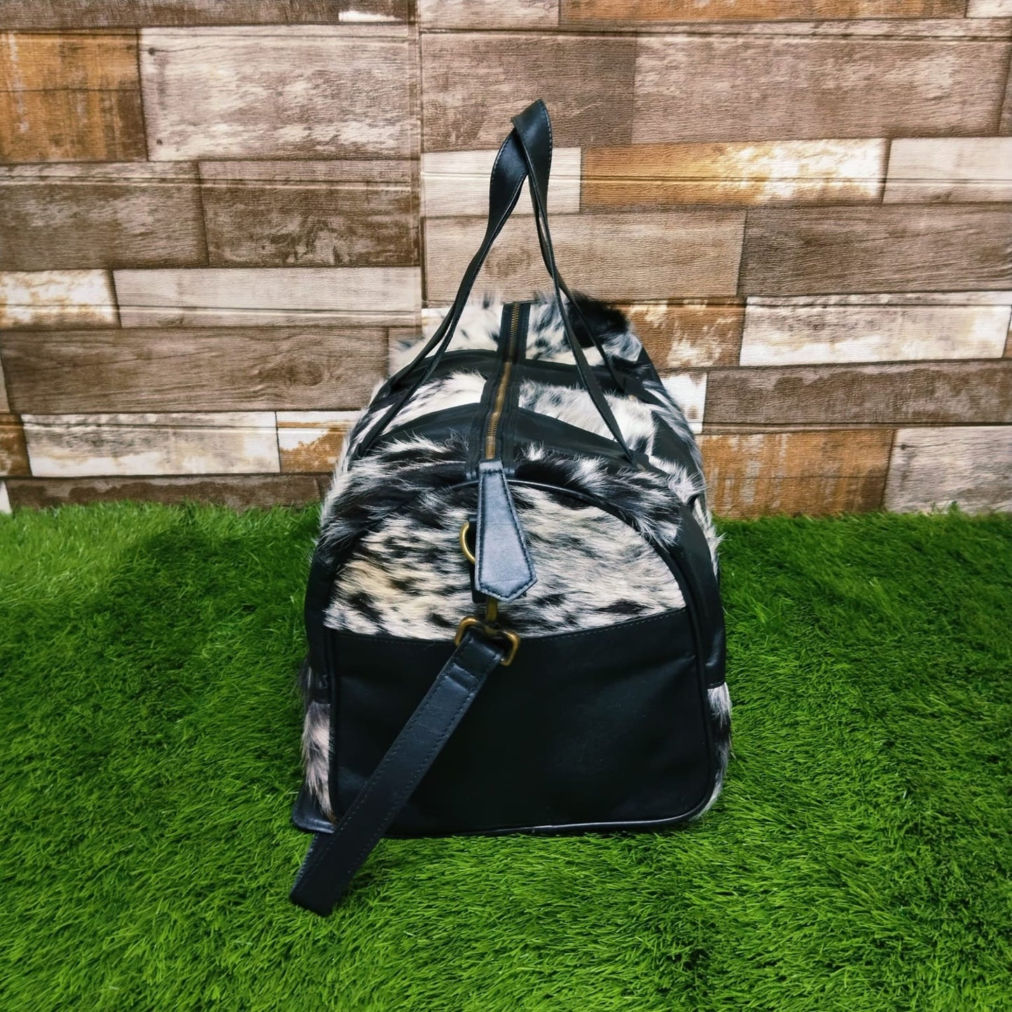 Explore the world with our premium cowhide duffle bag. Built tough for your journeys, it's a travel essential you can count on.