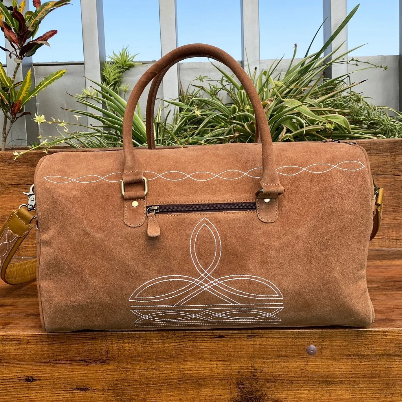 boot stitched weekender luggage