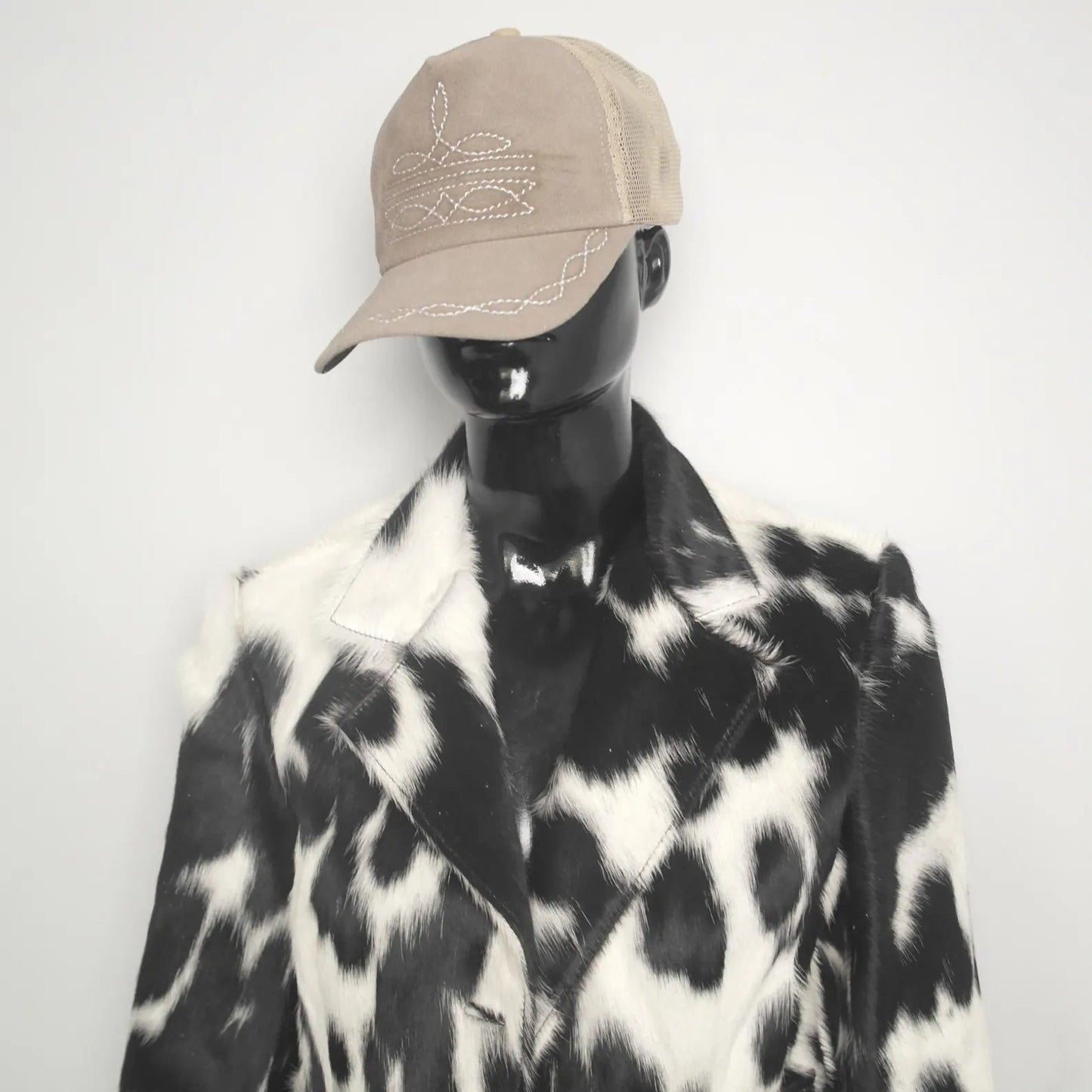 Genuine cowhide jacket in black white pattern. Ideal for rodeo events, country style, and winter wear. Unique fur coat for men and women western outfits.