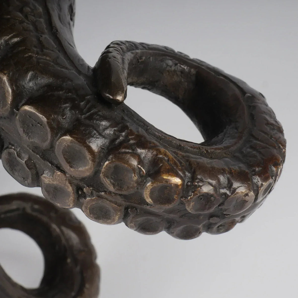 The bronze octopus hand casted brass marine art statue.