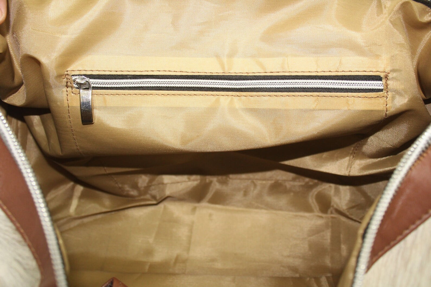 Cow skin travel bag: sleek design, perfect for adventures, sturdy and reliable
