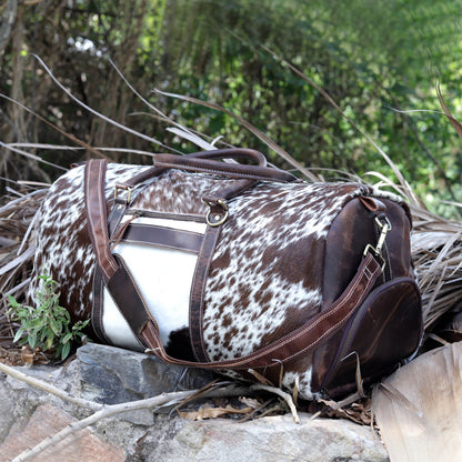 Indulge in elegance with a timeless cow fur overnight bag, your perfect companion for luxurious journeys.