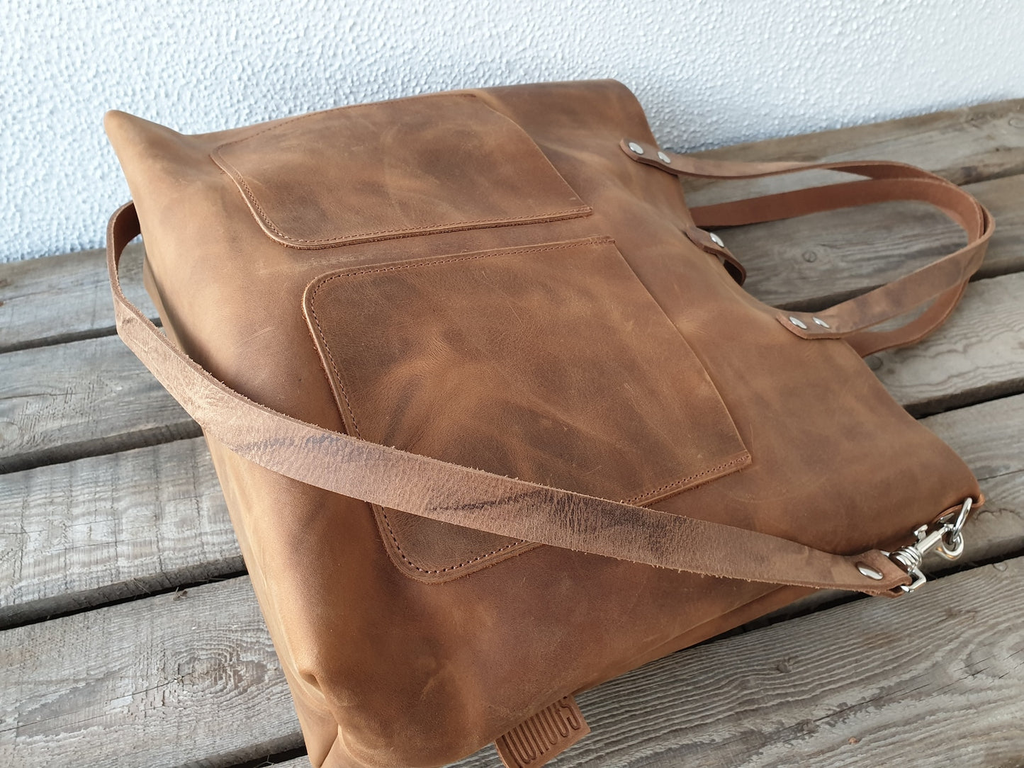 Large brown pull up leather tote bag