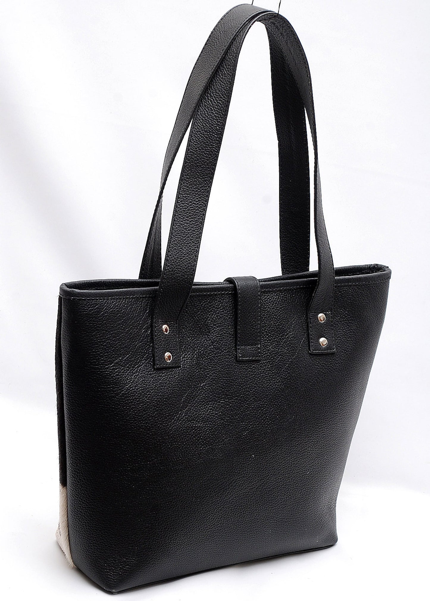 Find your perfect cowhide bag at our store.