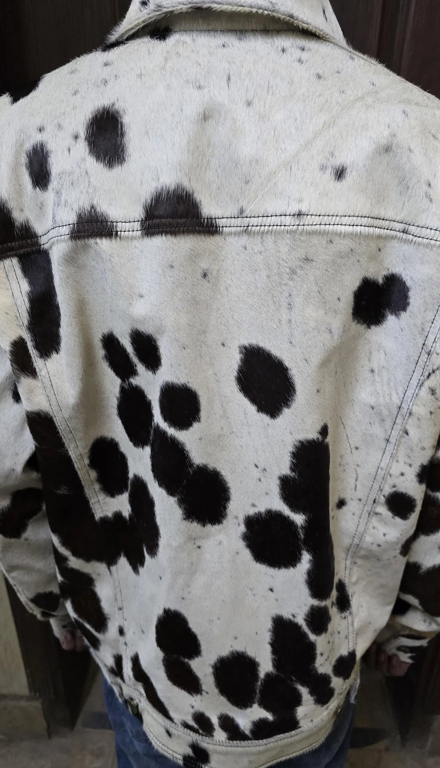Genuine cow fur jacket for men featuring bold black white cow print. Classic western design perfect for ranch looks, rodeo nights, and fashion-forward statements.