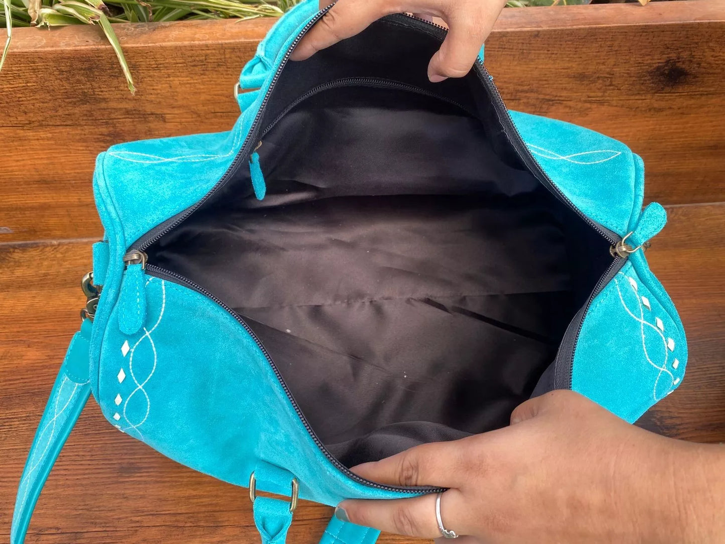 boot stitched weekender luggage