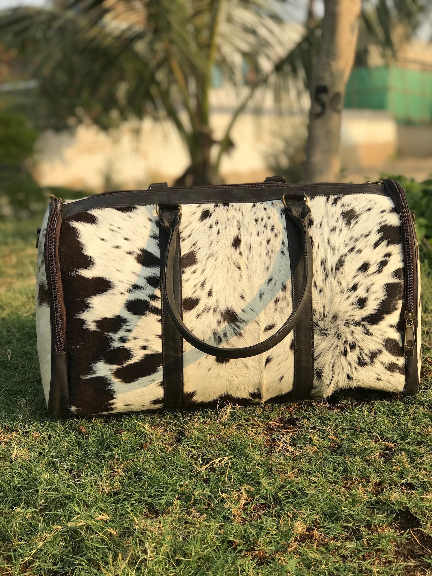 Travel in style with our premium cowhide duffle bag. Designed for durability and comfort, it's the perfect accessory for any adventure.