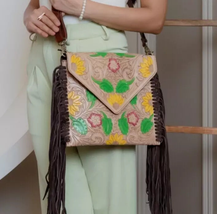 carved tooled leather sling purse