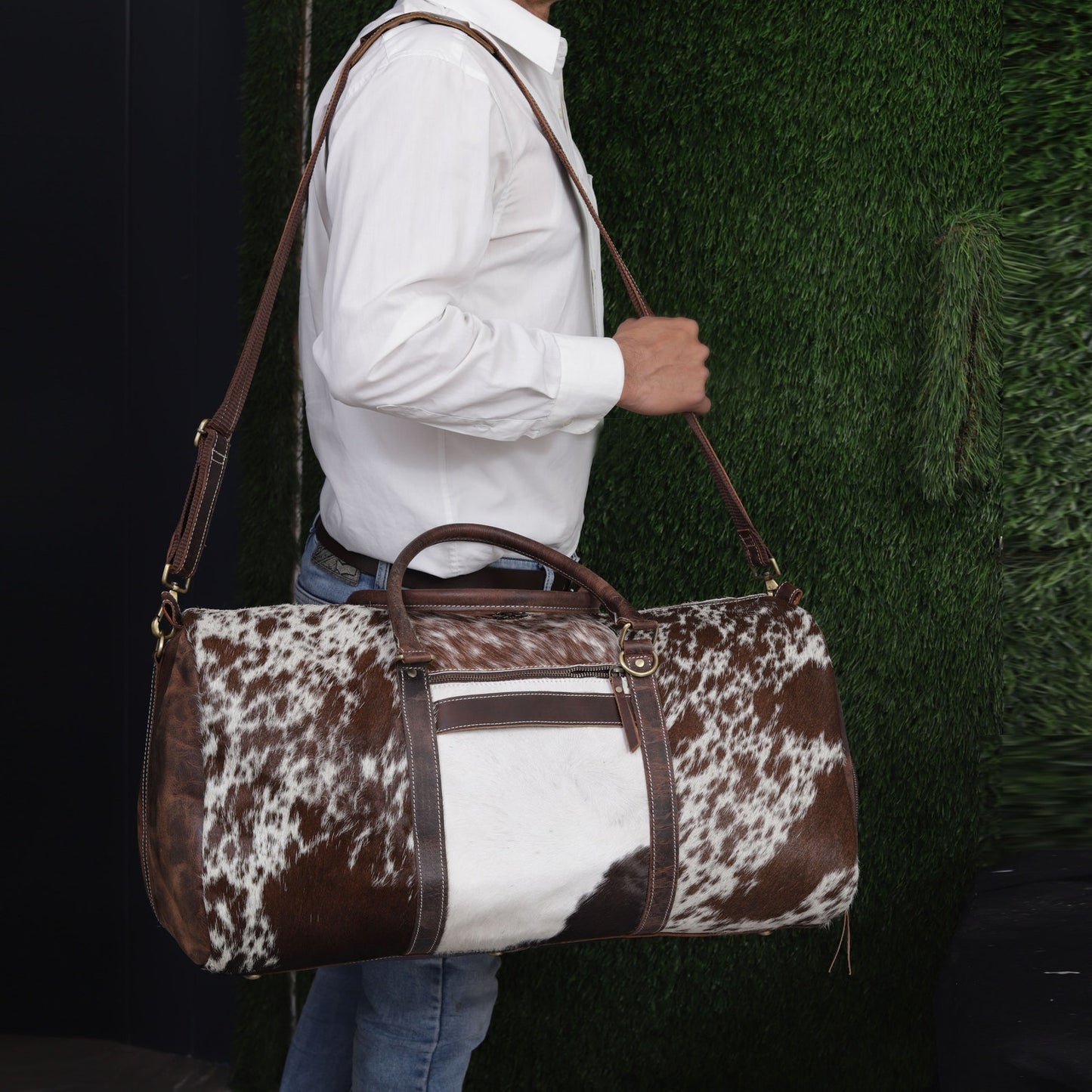 Unleash your wanderlust with a durable cow hide duffle bag, a symbol of adventure and refined taste.