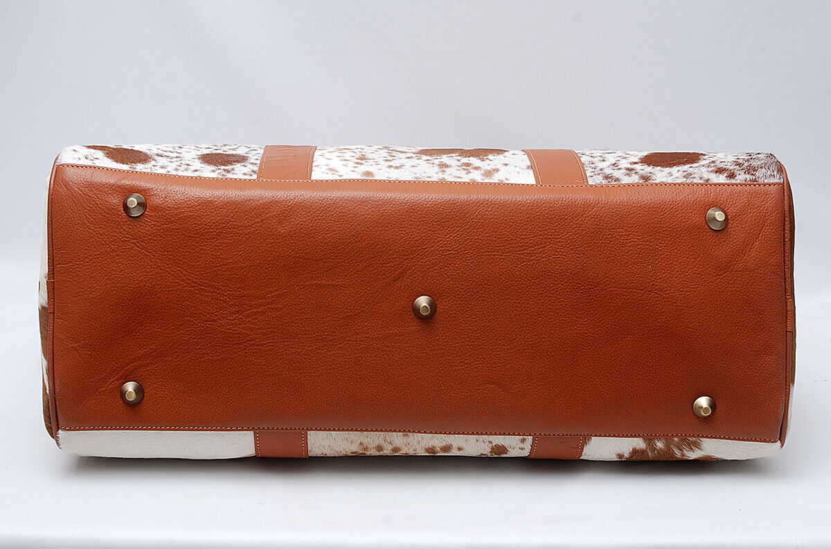 From overnight stays to weekend getaways, this cow skin weekender bag is your ultimate travel companion.