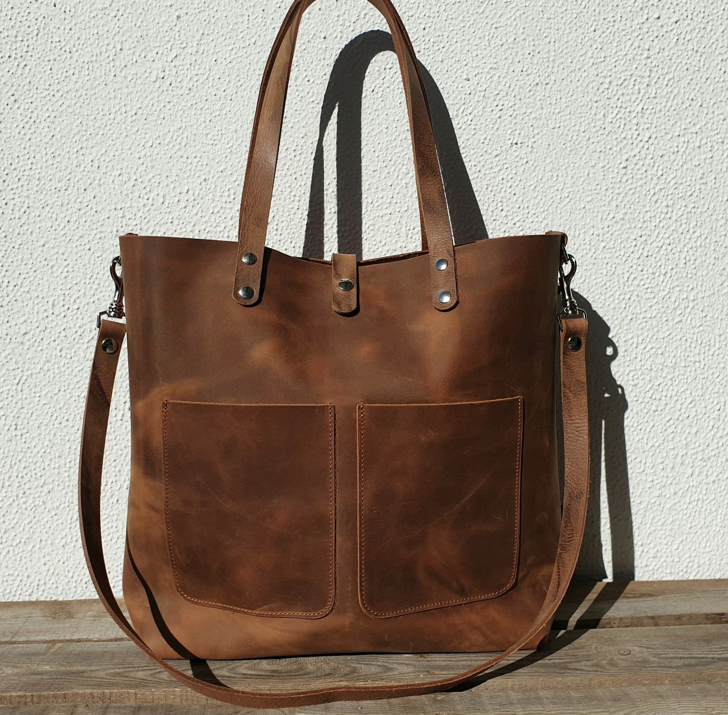 Large brown pull up leather tote bag