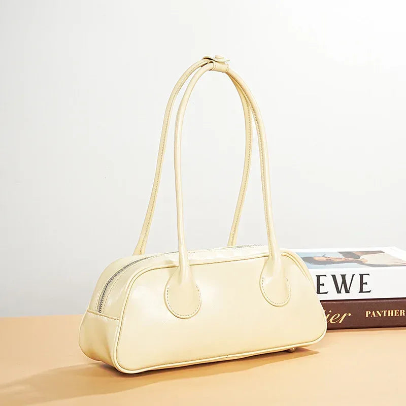 leather underarm shoulder baguette bag cream yellow