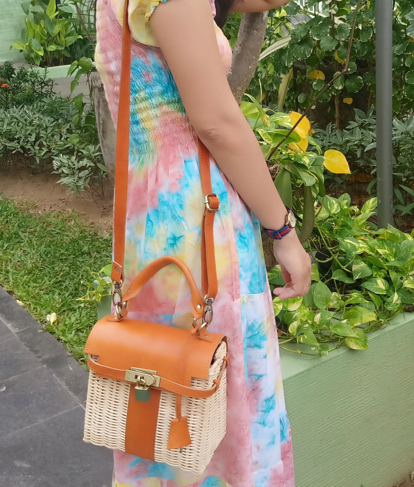 Handwoven rattan shoulder bag with leather