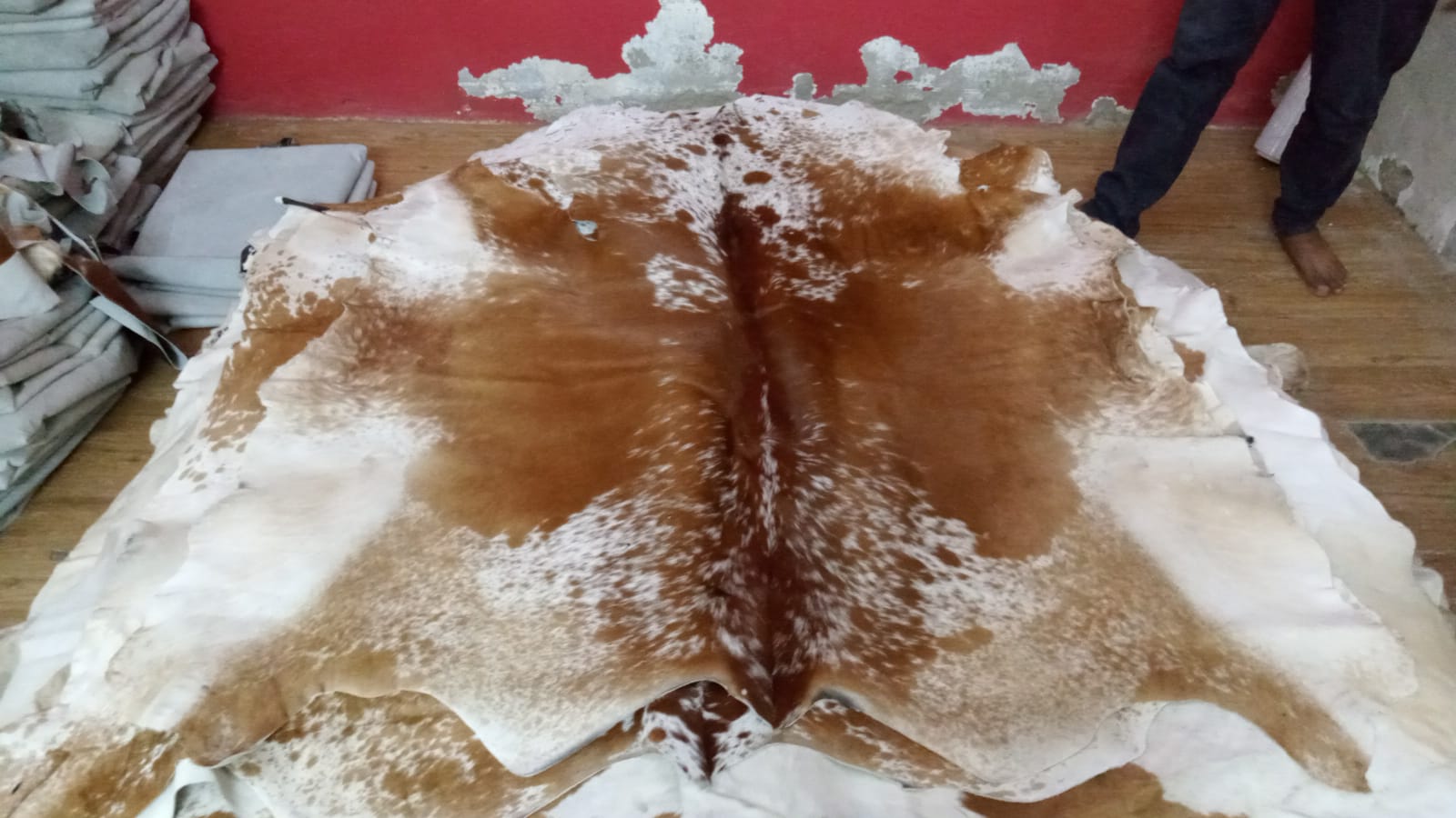 Add a touch of rustic elegance to your interior design scheme with our high-quality selection of hand-picked brown and white cowhide rugs.