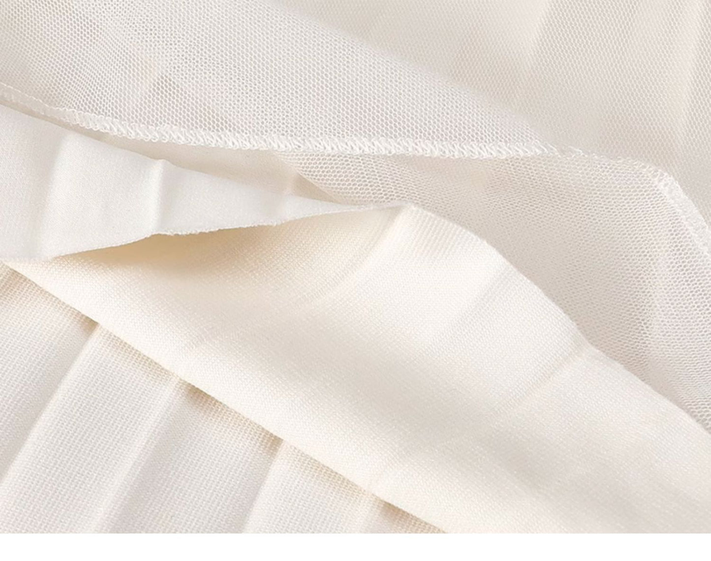 White pleated mesh skirt with elastic waistband
