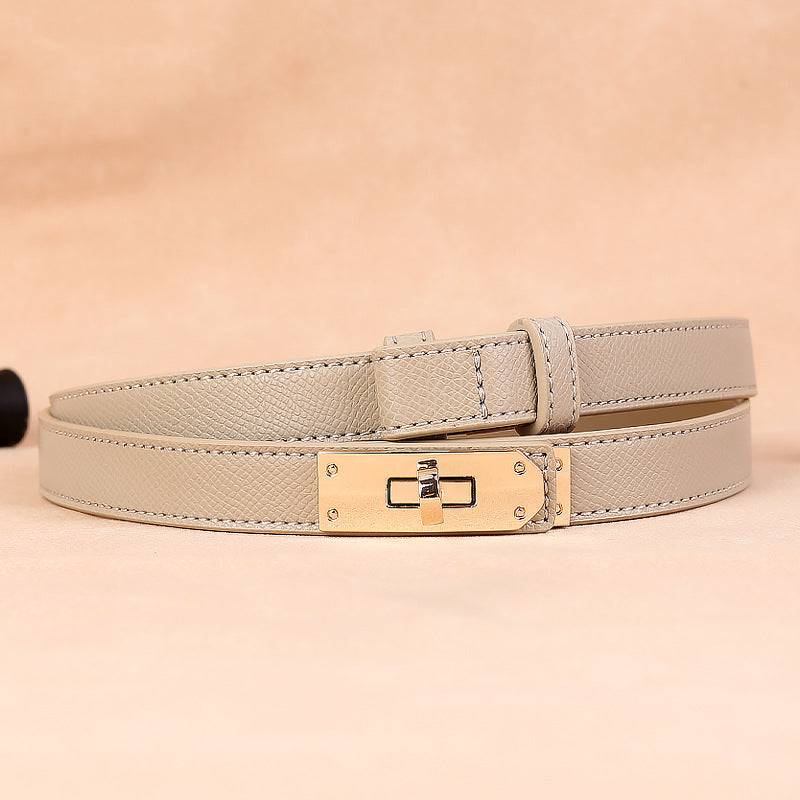 Slim leather belt for women with gold buckle