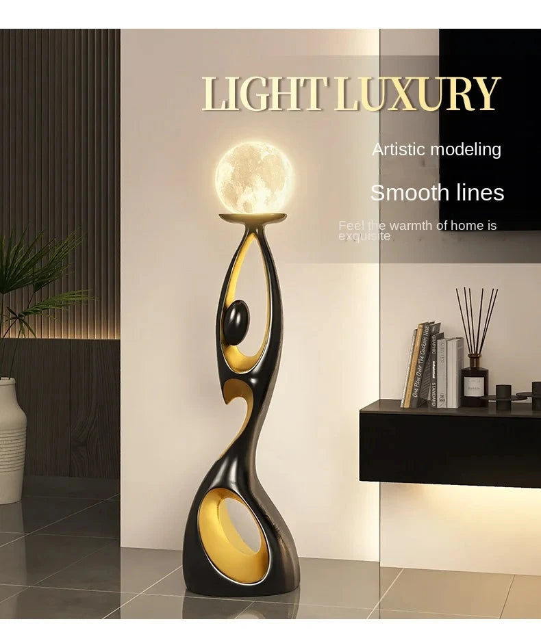 Artistic Resin Standing Light Sculptural Black and Gold Moon Floor Lamp
