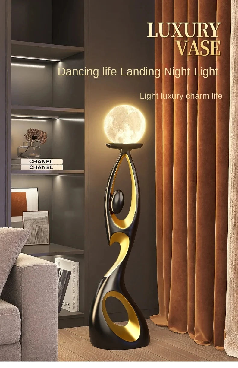 Artistic Resin Standing Light Sculptural Black and Gold Moon Floor Lamp