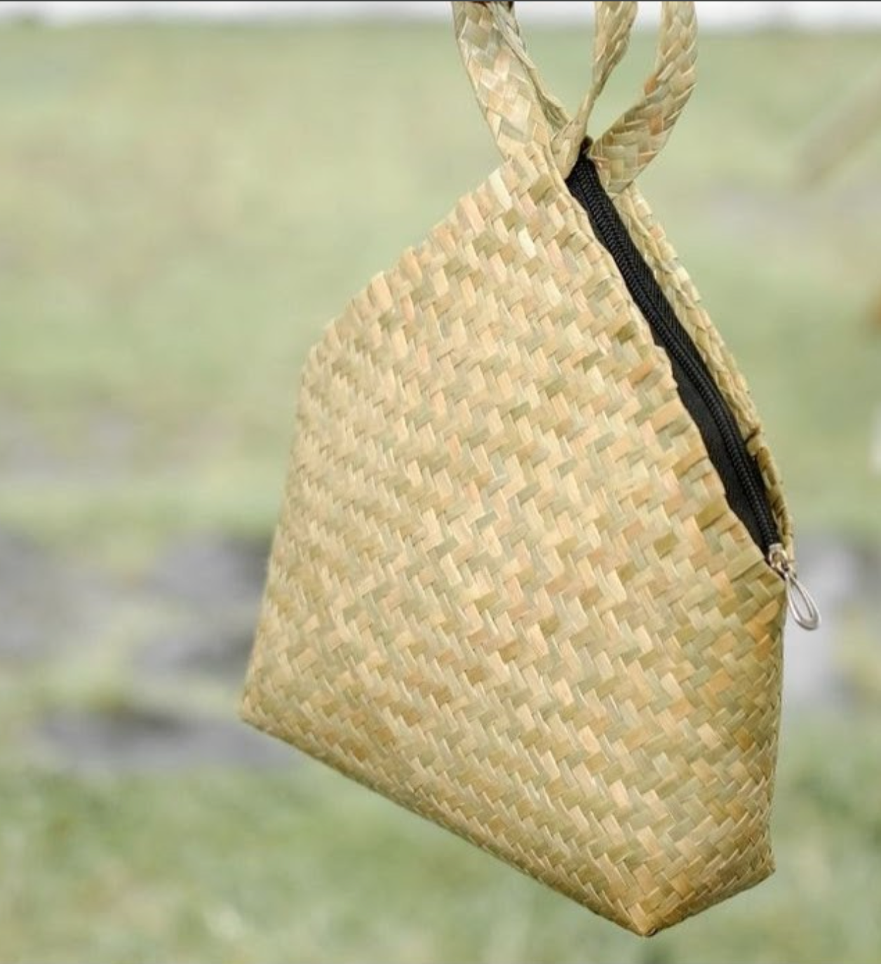 handcrafted woven straw handbag