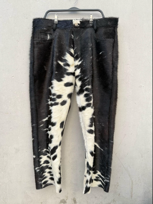 Shop real cowhide pants for men and women. Authentic cow leather with fur-on texture, bold cuts, and eye-catching back tail detail.