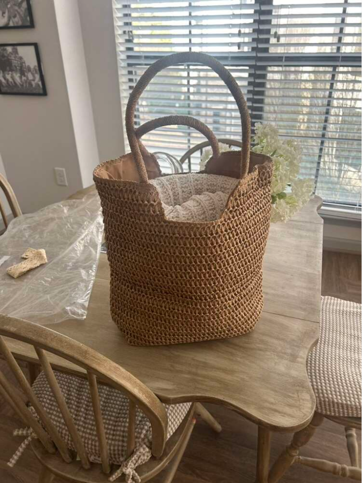 Group of beach bags with different handle shapes and weave styles