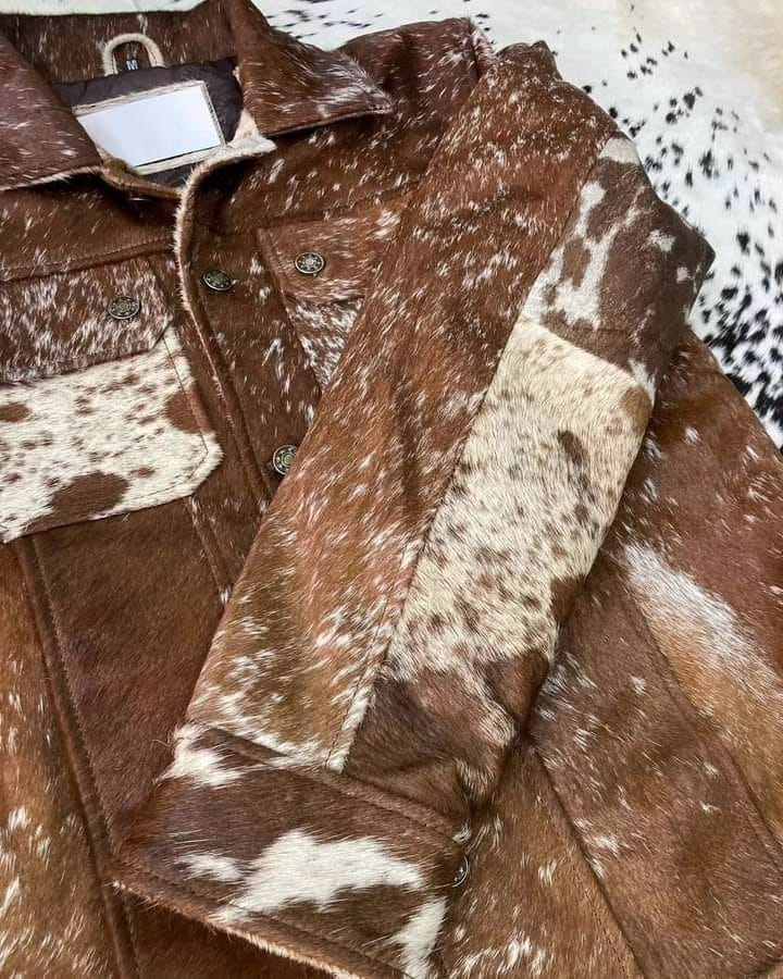 Authentic cowhide jacket men's and cowhide jacket women's designs in real hair-on-hide leather. Each real cowhide jacket showcases a naturally unique speckled pattern.
