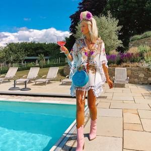 Round Rattan Bag In Blue Sling Purse