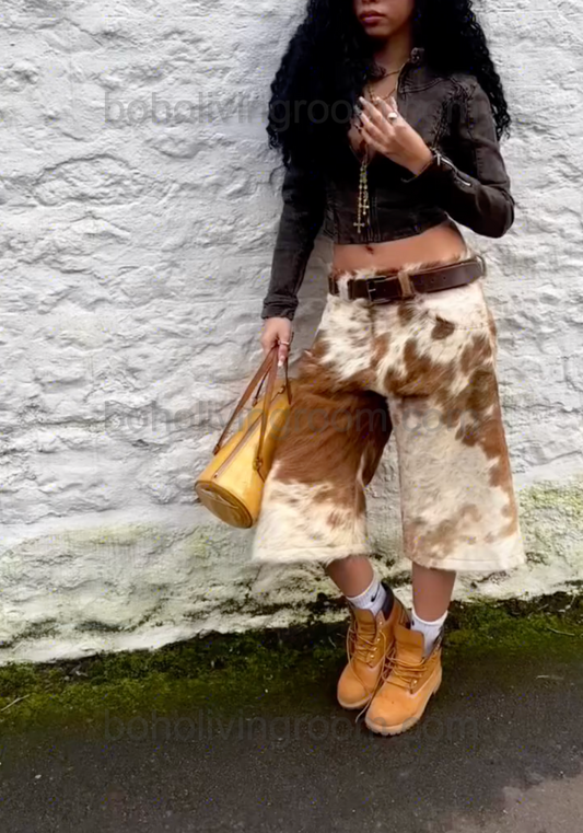 Long cow print shorts for women in real hair on hide—ideal for rodeo, western events, and southern styling.