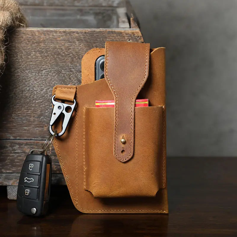 Designed for easy carrying, this leather belt pouch keeps your phone and small items secure. A simple loop attachment ensures a snug and comfortable fit.