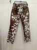 Shop authentic cow print trousers made from genuine cow fur hide. These brown and white cow pants are ideal for men and women with western flair.