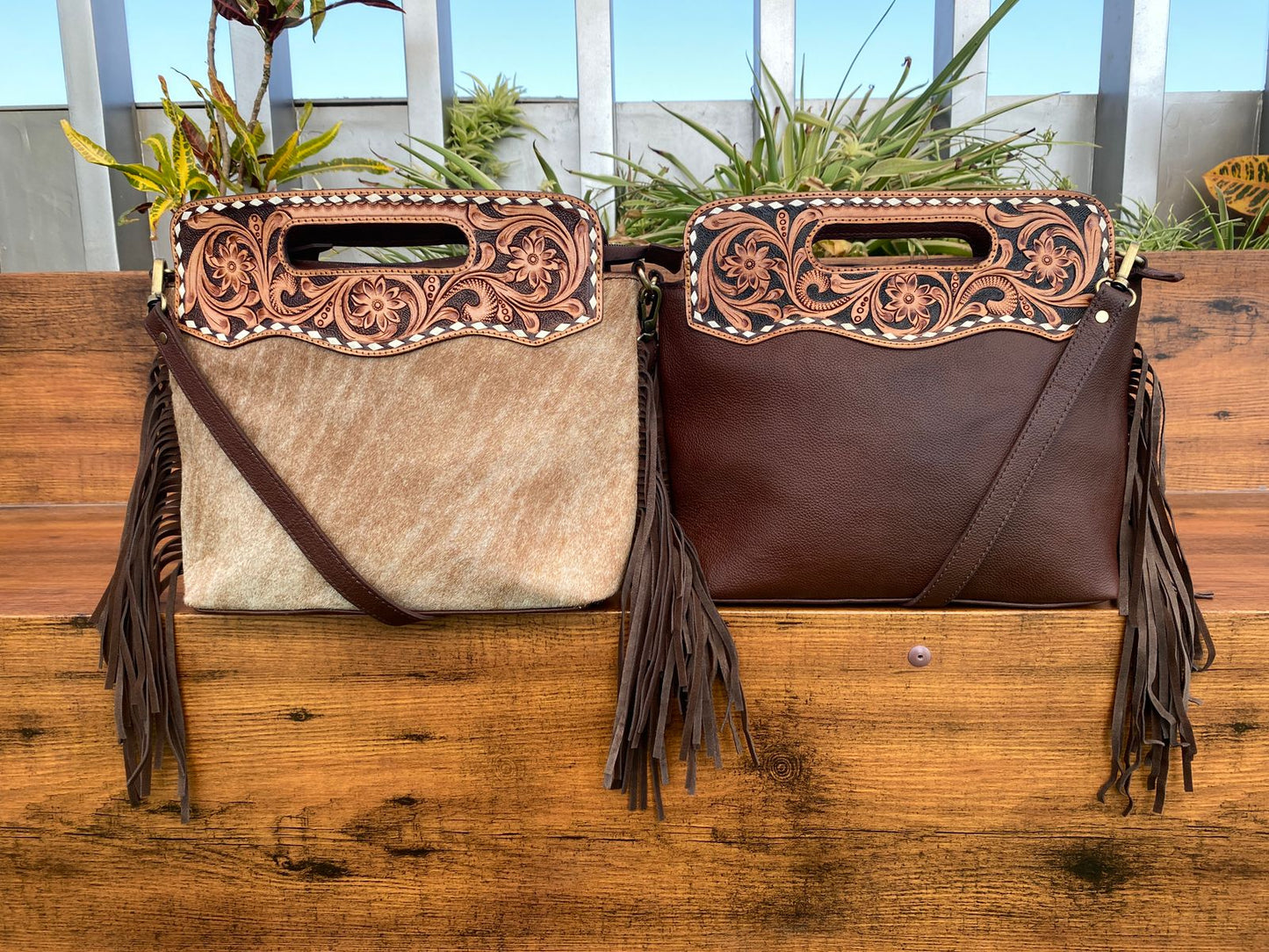 hair on cowhide and leather tooled messenger bag