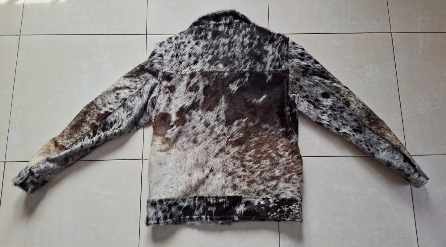 Tricolor cow jacket made from real hair-on-hide leather. Men’s western cowhide coat ideal for ranch wear and statement fashion styling.