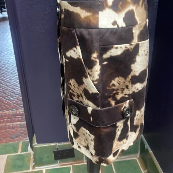 Step into western living with this real cow print mini skirt. A great addition for those who love country style and cow girl fashion.