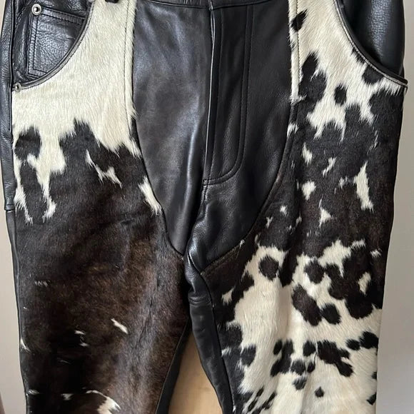 A fusion of cowhide fur and leather gives these trousers a distinct feel. Designed with attention to texture, they offer a standout appeal for those who prefer something different.