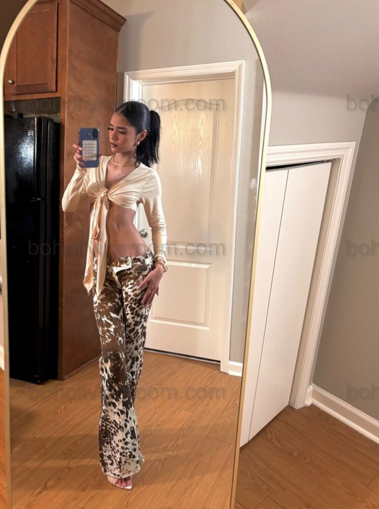 Stand out in these speckled cow print pants made from real hair-on cowhide. Perfect for rodeo events, western outfits, or bold cowgirl looks.