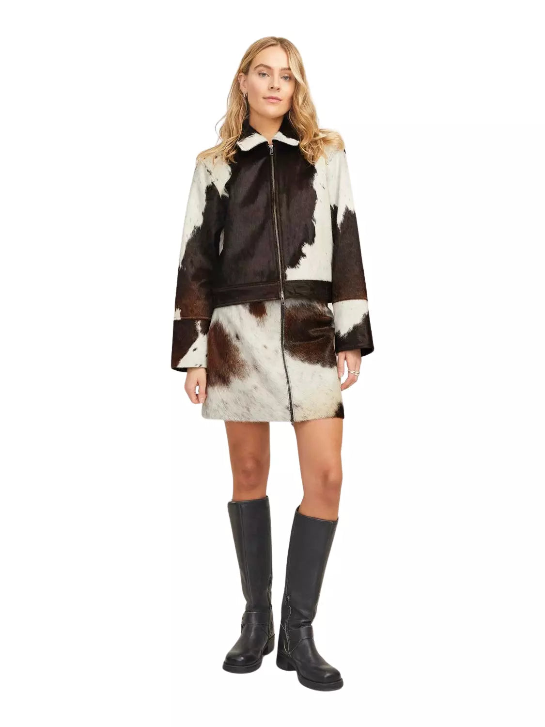 Cowhide jacket and cow skirt outfit made from real cow skin. Bold western set for rodeo events, country festivals, and outdoor gatherings.