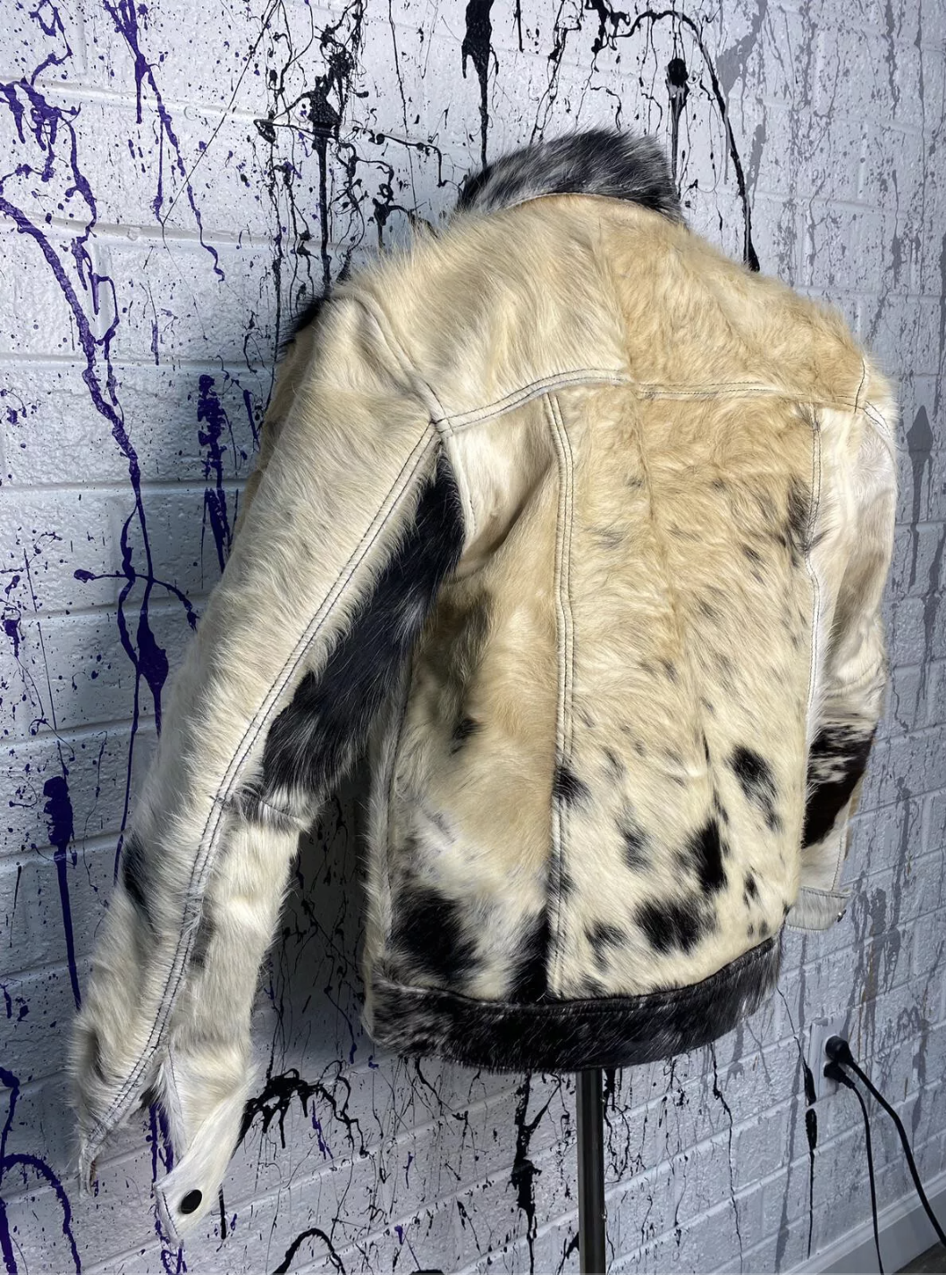 Real hair on cowhide jackets with cow print design for men and women. Unique cowhide jackets made from authentic tricolor cow fur for bold Western style.
