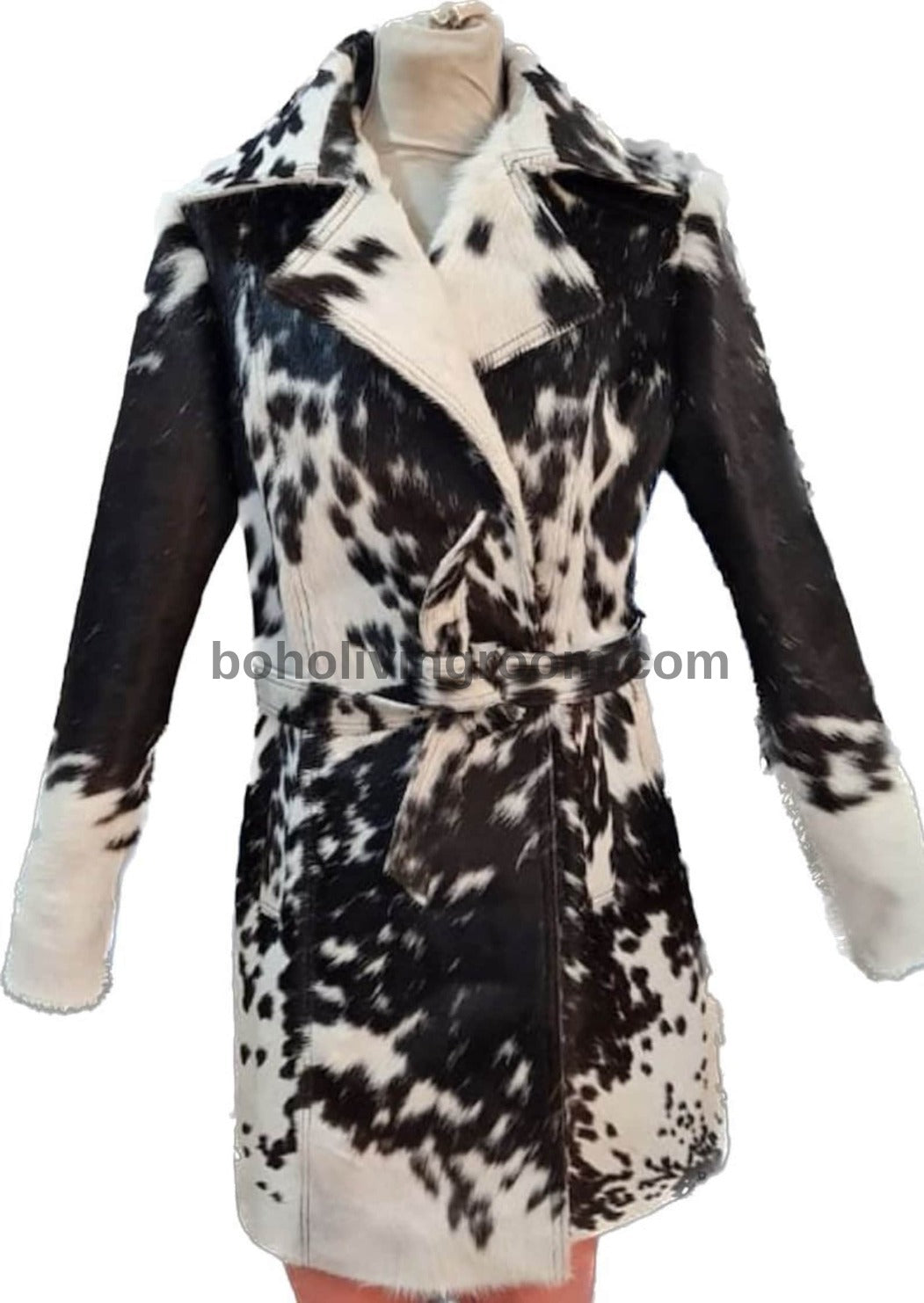 Black and white cowhide jacket for women made from real hair-on-hide leather. Western trench coat design with bold contrast and natural texture.